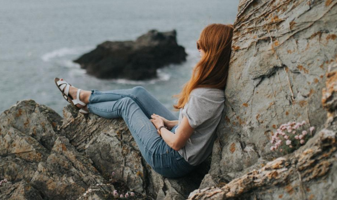 Learning to Sit with What Is